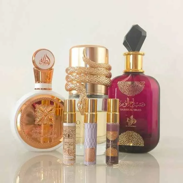 Coleção de perfumes árabes destacando notas de oud, âmbar e especiarias.